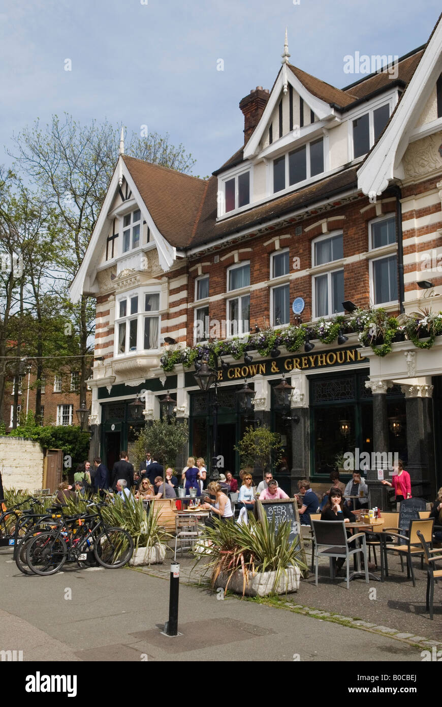 Dulwich Village South London SE21 London UK College Road The Crown and Greyhound Public House people summer sunshine HOMER SYKES Stock Photo