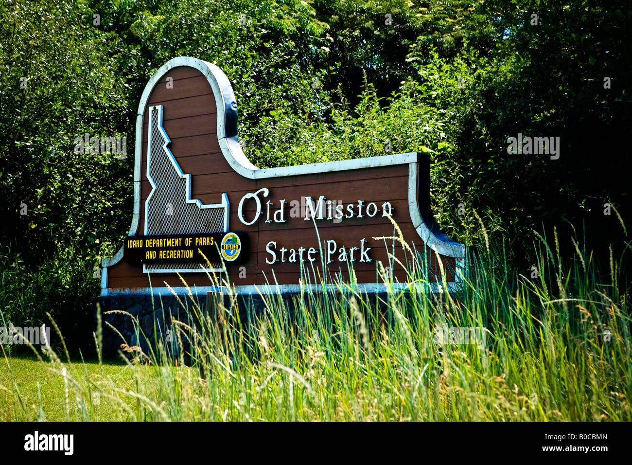 Image of the welcome sign for the Old Mission State Park in Cataldo Idaho Summer morning light Stock Photo