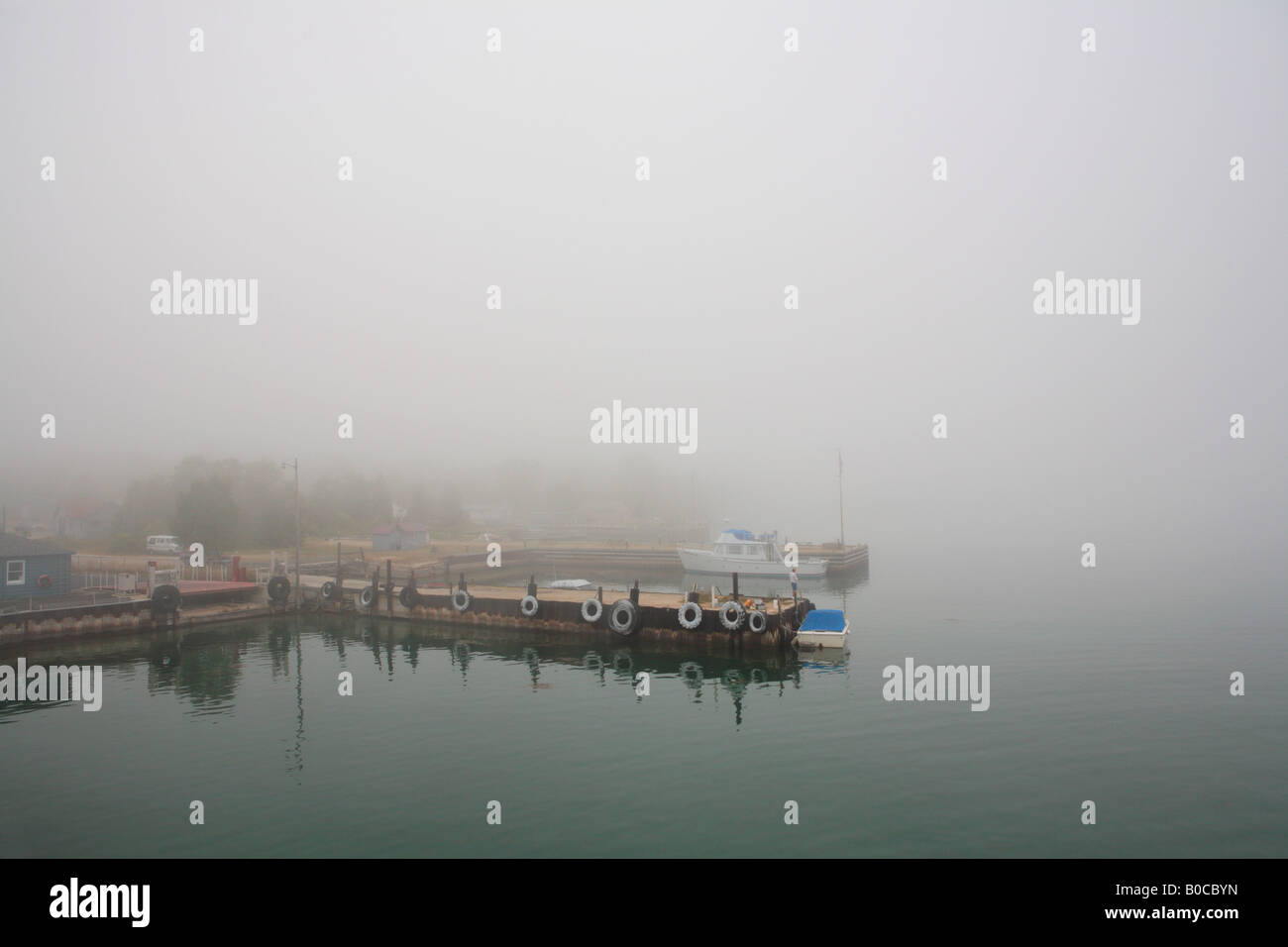 WASHINGTON ISLAND HARBOR SHROUDED IN FOG WASHINGTON ISLAND DOOR COUNTY NORTHEASTERN WISCONSIN
