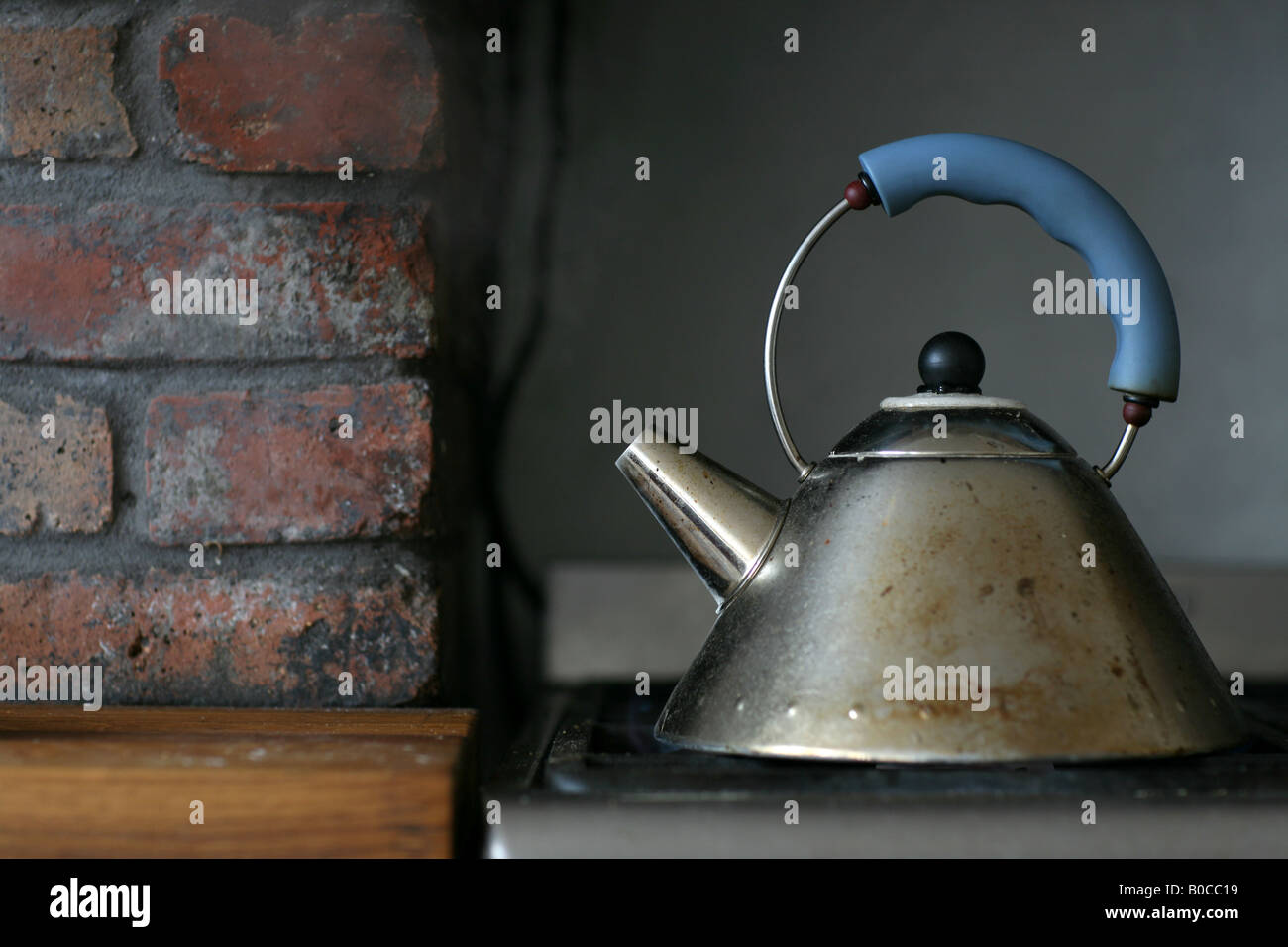 A kettle boiling on a hob Stock Photo Alamy
