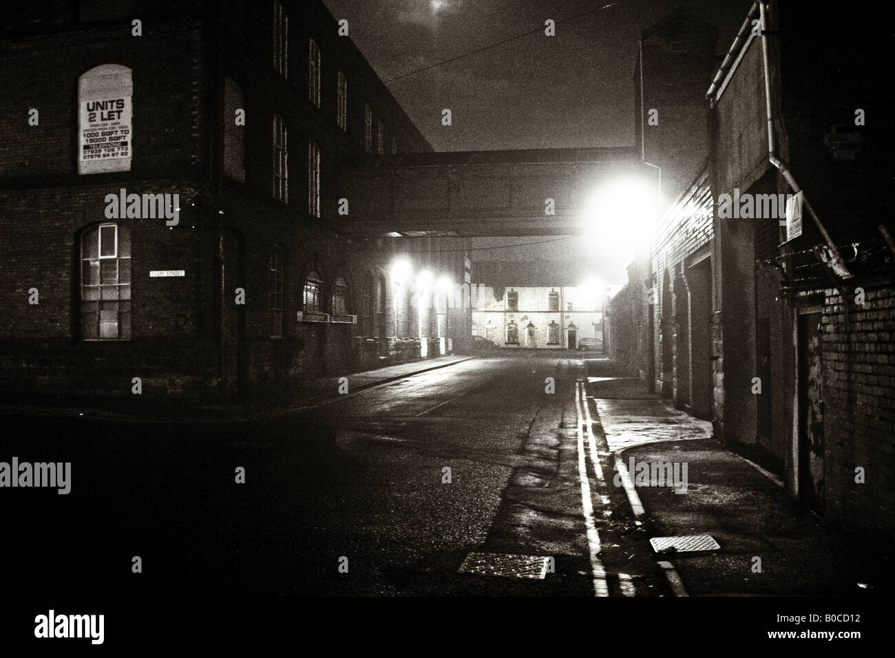 Moody night image of Victorian mills near Bury Lancashire UK Stock ...