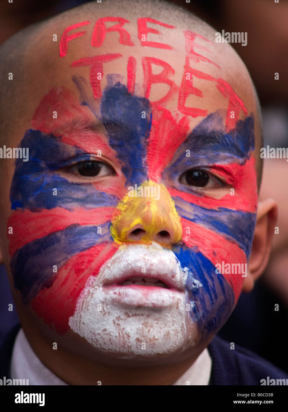Tibetan boy at protest against the Chinese Stock Photo