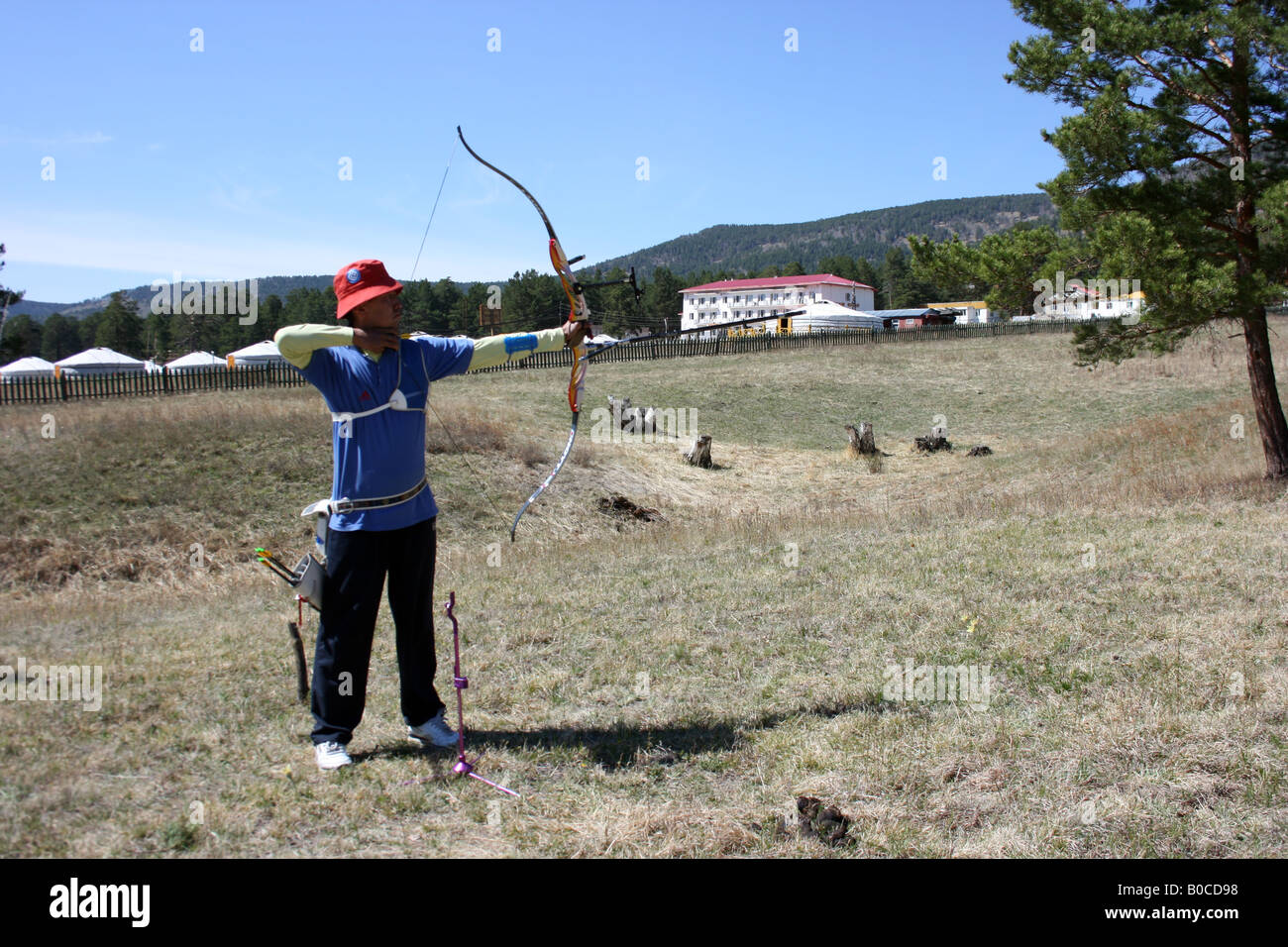archer near ger camp, Mongolia Stock Photo