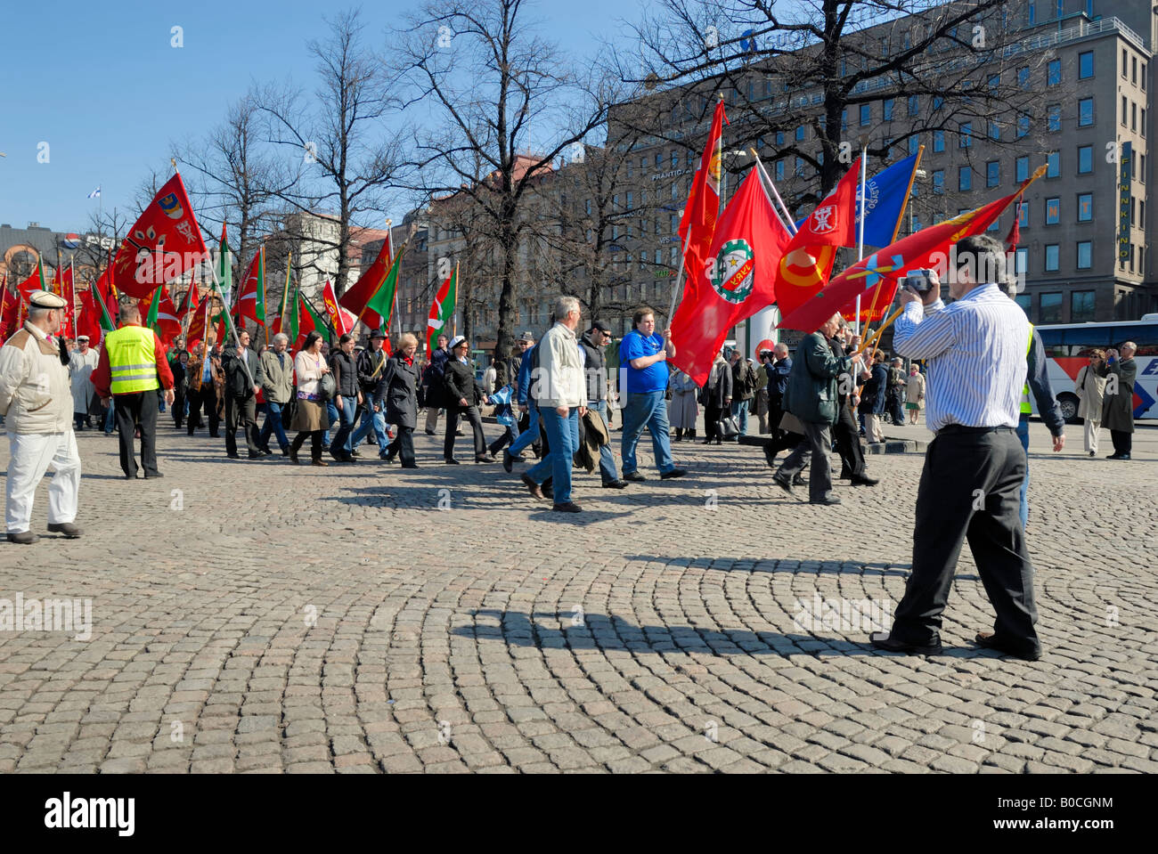 The Finnish labour union, SAK, May Day parade with red union flags, Helsinki, Finland, Europe. Stock Photo