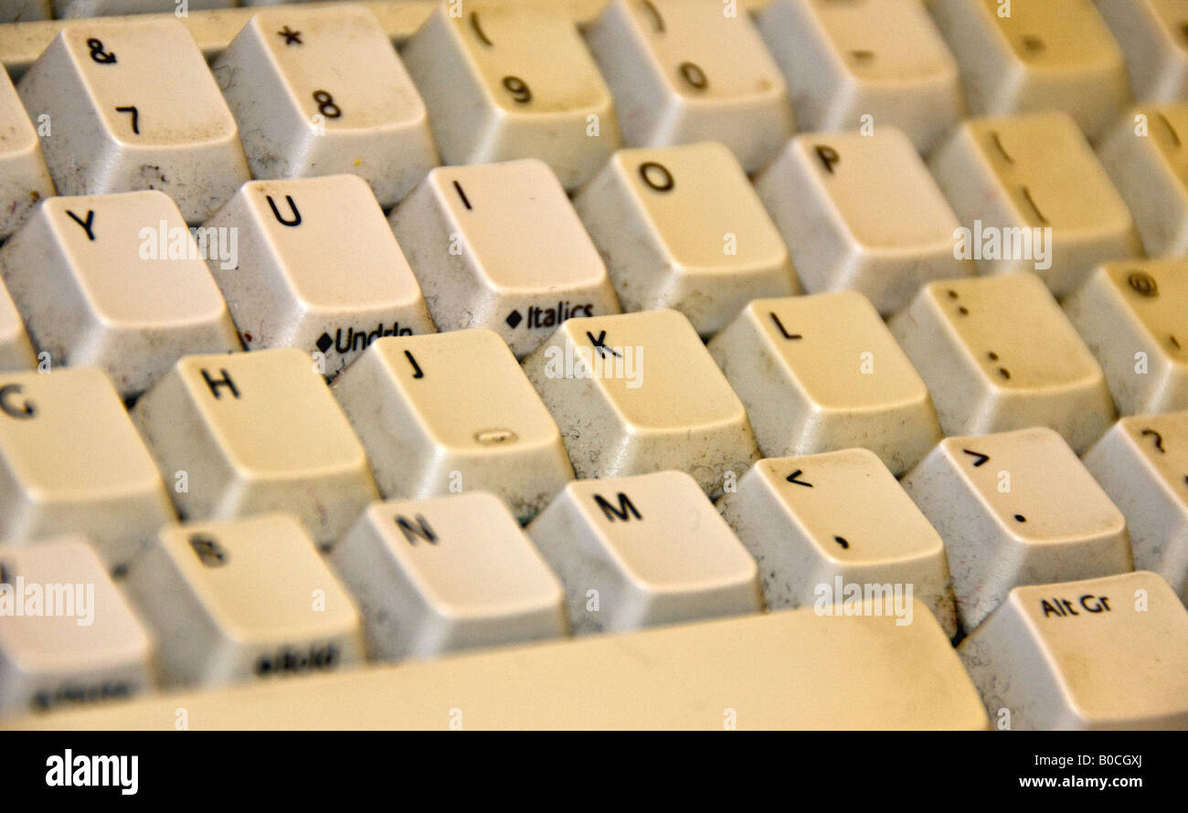 A closeup view of a dirty computer keyboard. Stock Photo