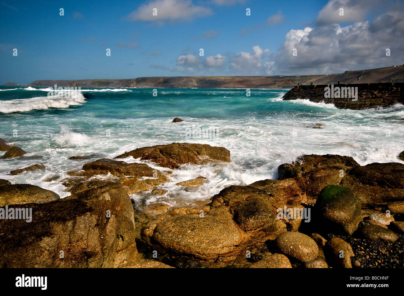Incoming Tide at Sennen Cove in Cornwall. Stock Photo