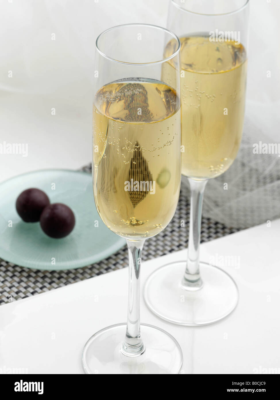 Champagne glasses and chocolate truffles editorial food Stock Photo Alamy