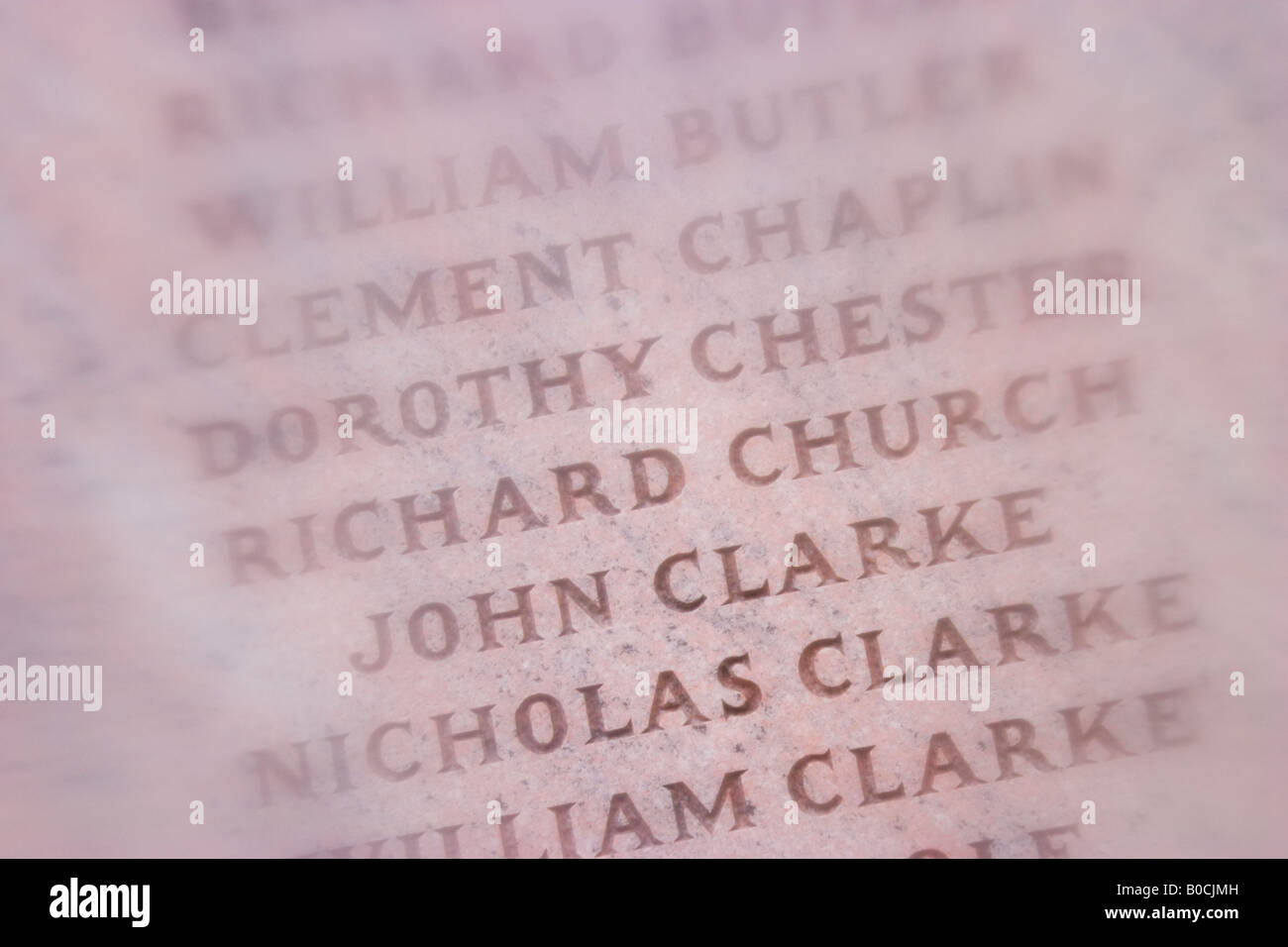 Names on a large stone monument in an old graveyard Stock Photo Alamy