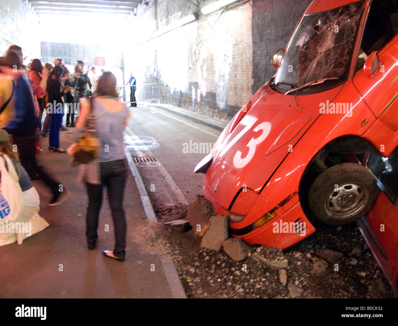 Crashed car - an image from The Cans Festival, a London street exhibition that graffito artist Banksy helped to open, May 2007 Stock Photo