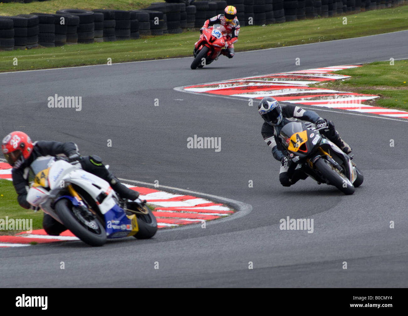 Alastair Fagan Riding a Triumph Motorbike in the Silkolene British Supersport Cup at Oulton Park Cheshire England UK Stock Photo