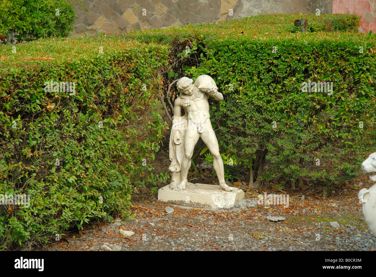 Statue in garden of Villa in Roman city of Herculaneum near Naples in