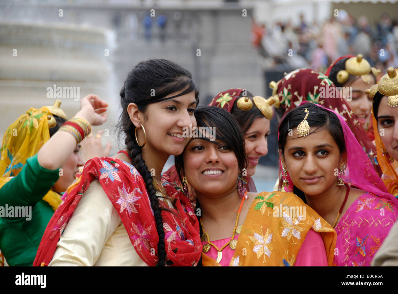 Sikh female dancers in colourful traditional costumes at 2008 Vaisakhi Sikh New Year Festival in Trafalgar Square London Stock Photo
