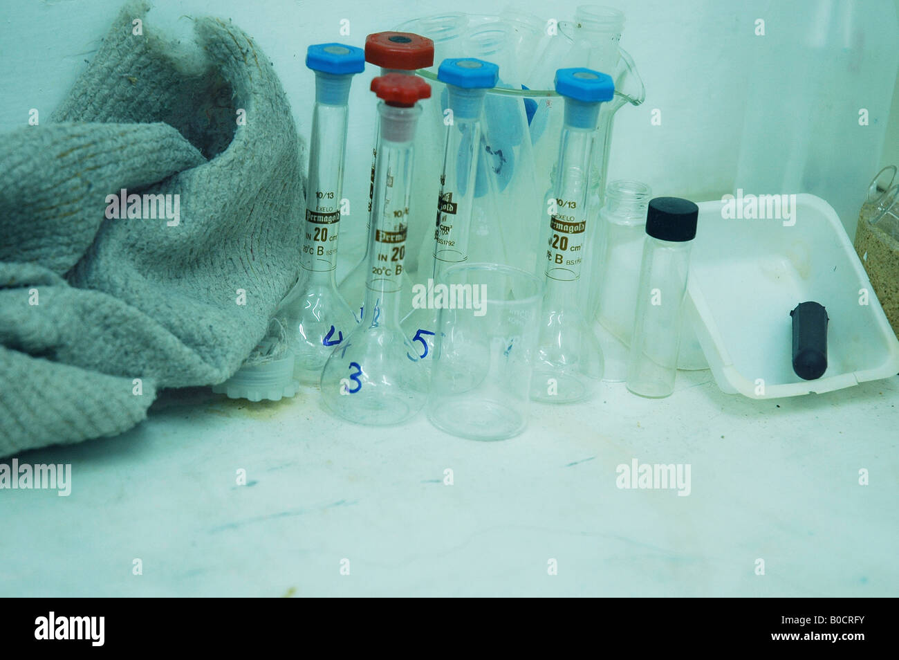 A shot of a group of chemical jars and containers in a laboratory Stock