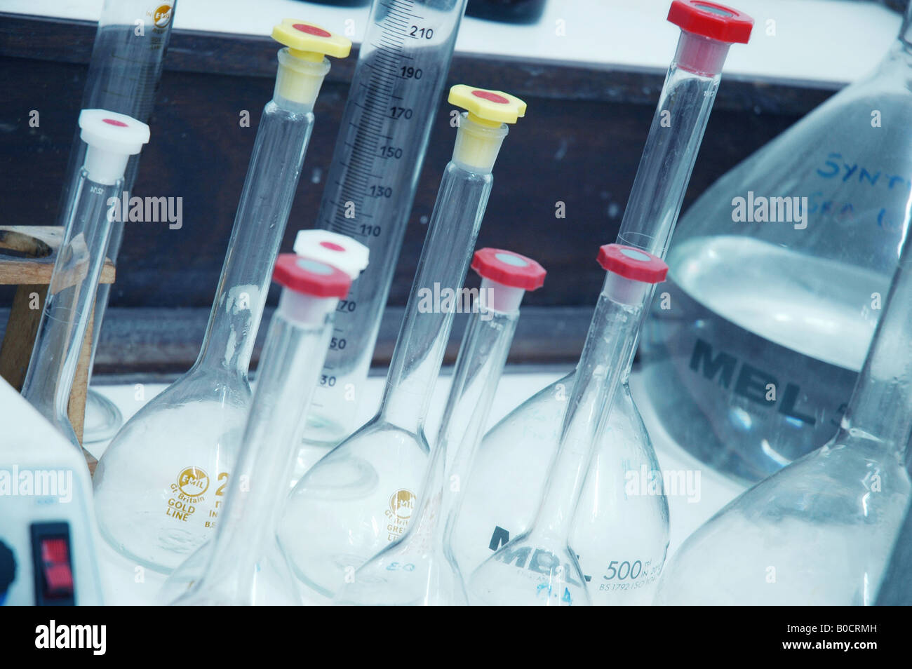 A shot of a group of chemical jars and containers in a laboratory Stock