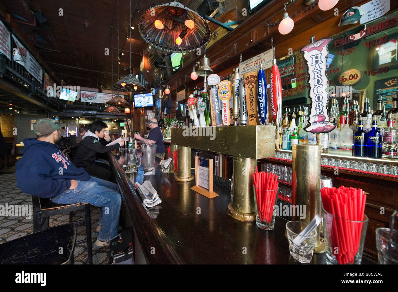 Interior of a typical bar in Greenwich Village (West Village)with beer pumps in foreground, Manhattan, New York City Stock Photo
