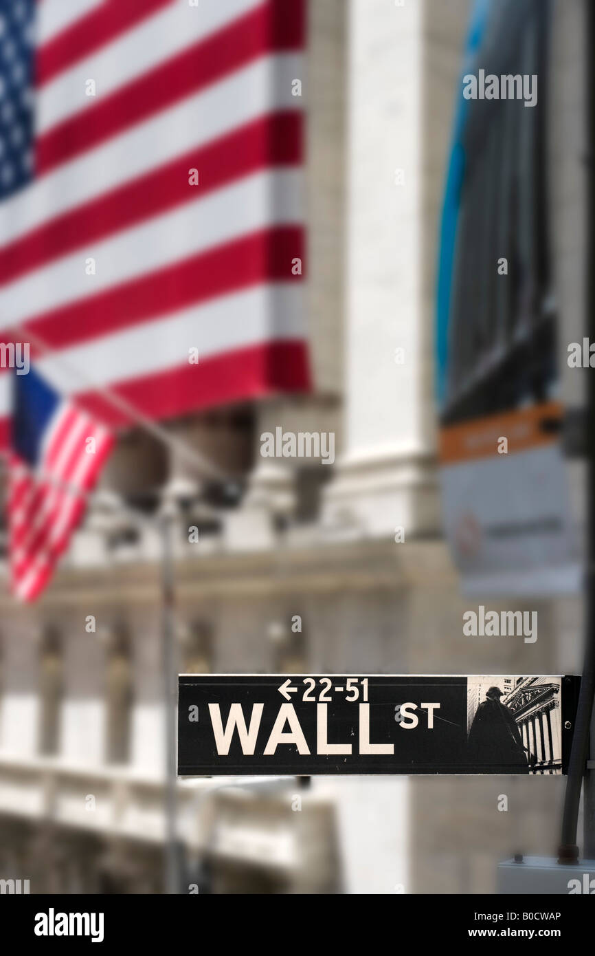 Wall Street sign in front of the New York Stock Exchange (NYSE), Wall Street, Financial District, NYC, New York City Stock Photo