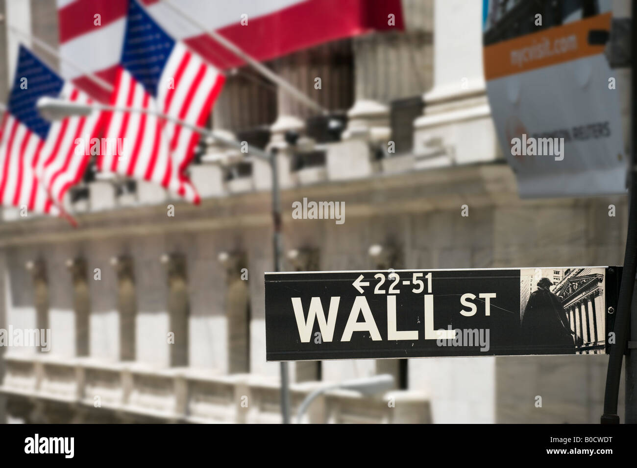 Wall Street sign in front of the New York Stock Exchange, Wall Street, Financial District, New York City Stock Photo