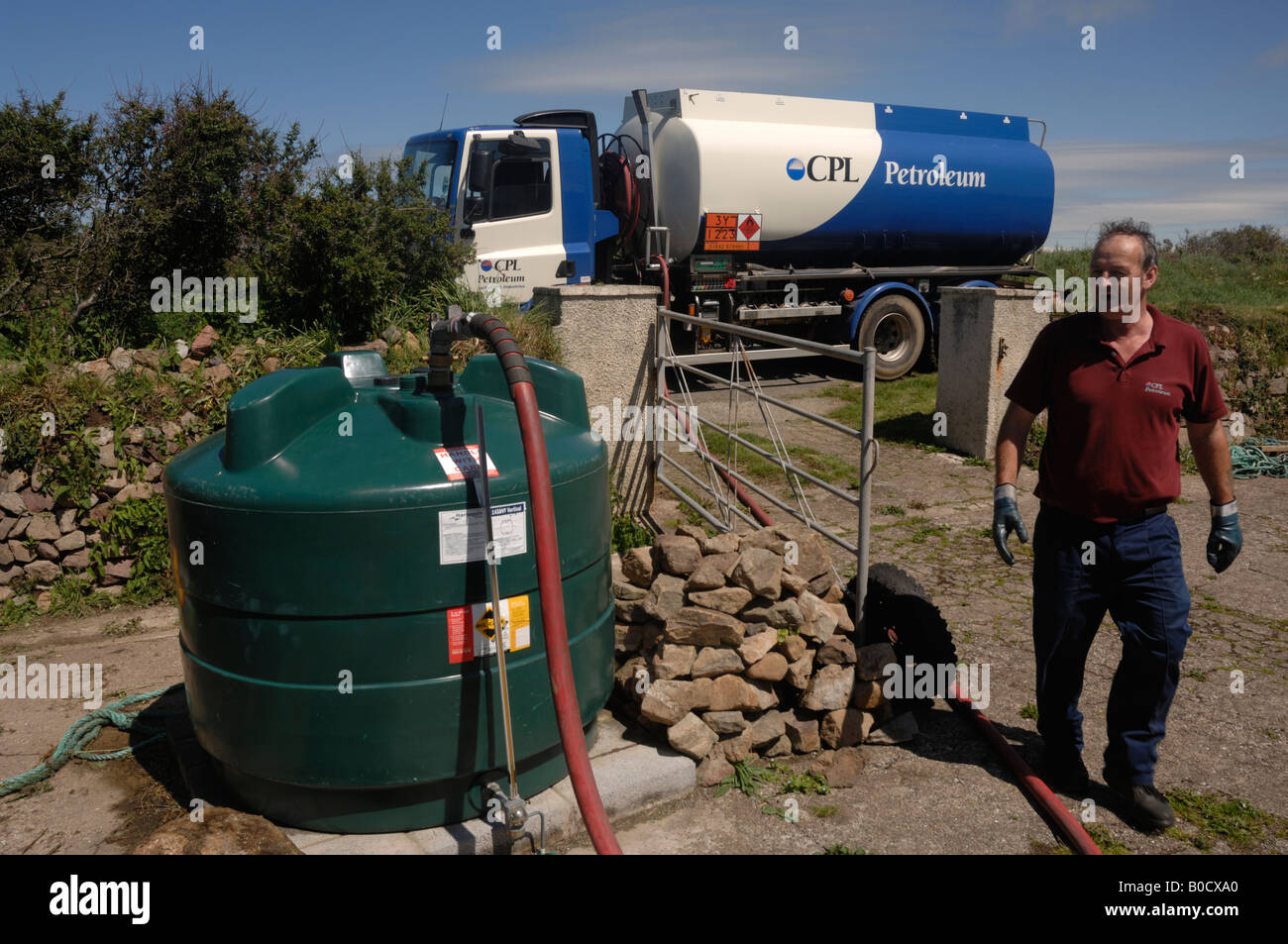 CPL oil road tanker delivering domestic heating oil in rural location