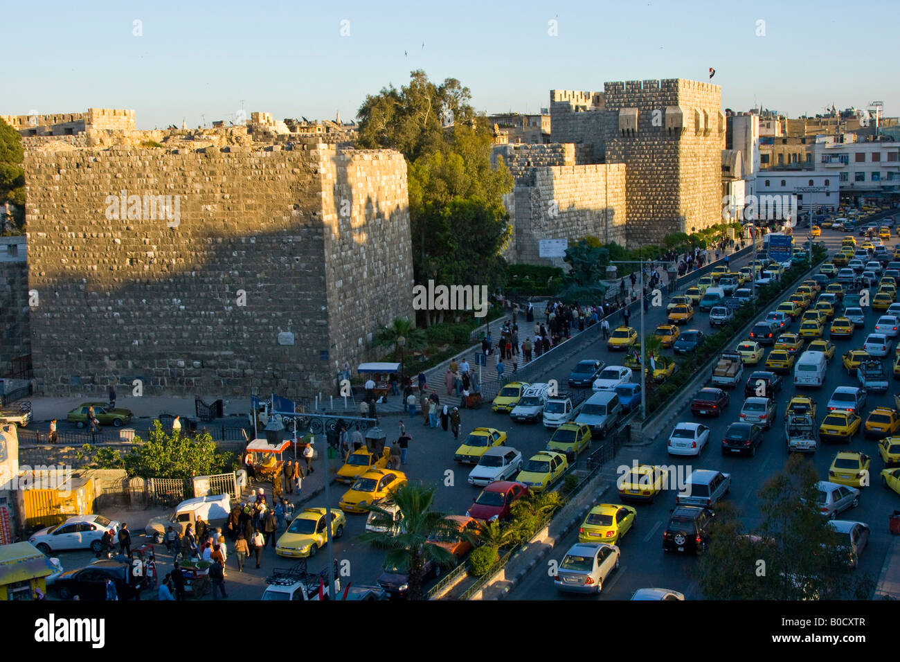 Crowded Street Outside the Citadel of the Old City in Damascus Syria Stock Photo