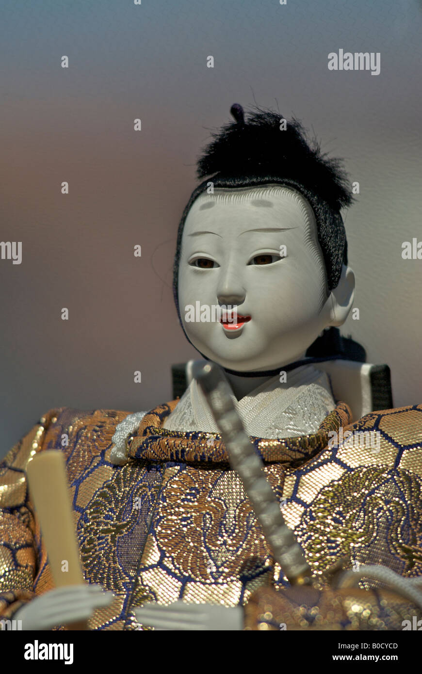 Ornate Japanese doll in traditional costume Stock Photo Alamy
