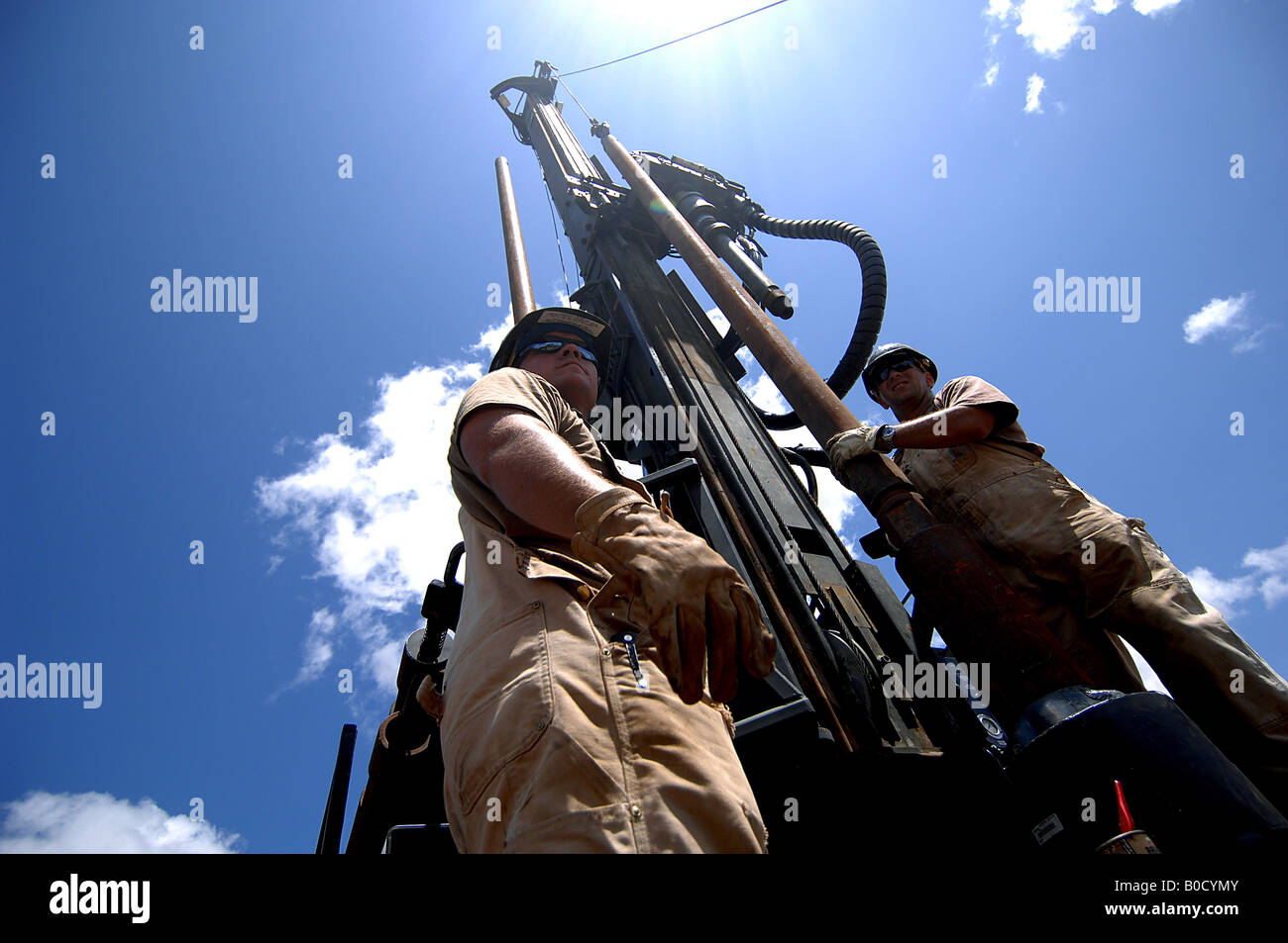 Seabees from Naval Mobile Construction Battalion assemble a rig during a well drilling project in Shaba Kenya Stock Photo