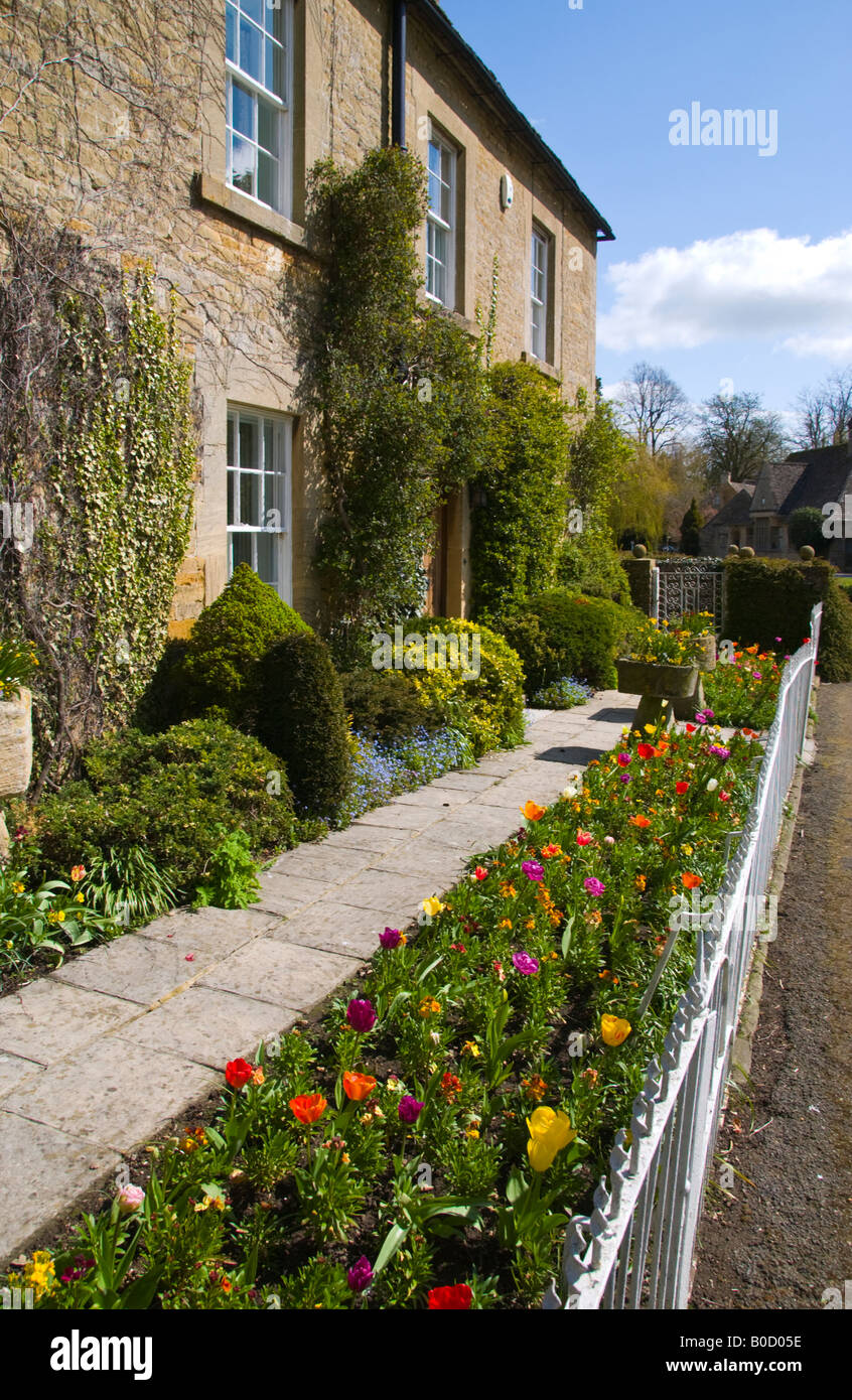 Pretty house in village of Lower Slaughter Cotswolds Gloucestershire England UK EU Stock Photo