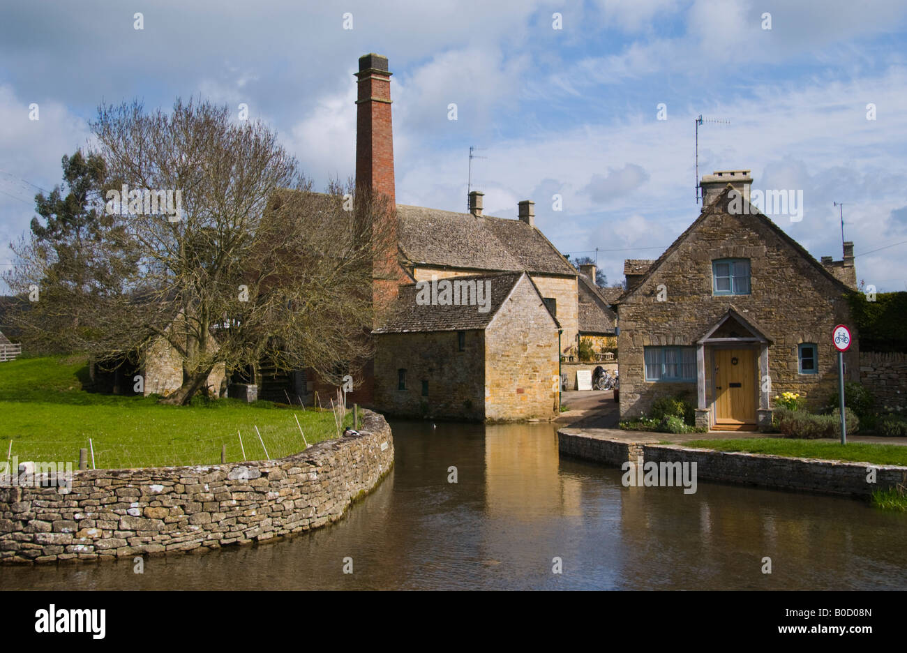 Mill Museum on River Eye in Cotswold village of Lower Slaughter Gloucestershire England UK EU Stock Photo