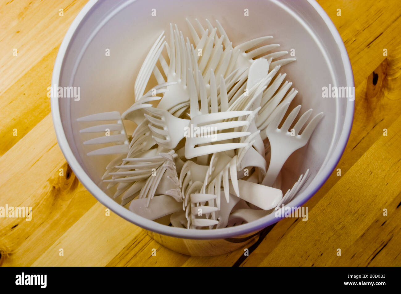 Plastic forks in a plastic bucket Stock Photo Alamy