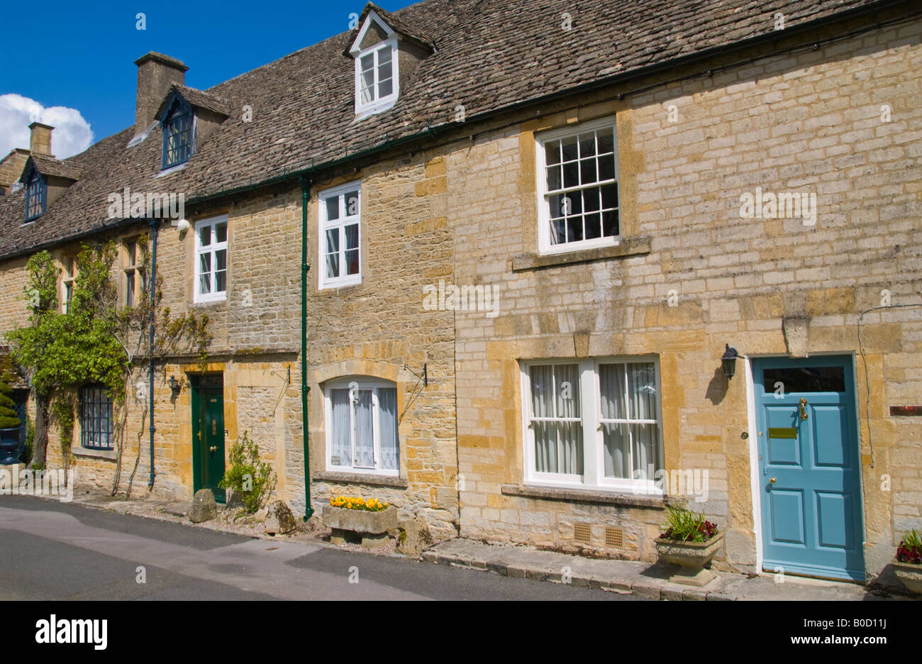 Terrace of houses in Stow on the Wold Cotswolds Gloucestershire England UK EU Stock Photo
