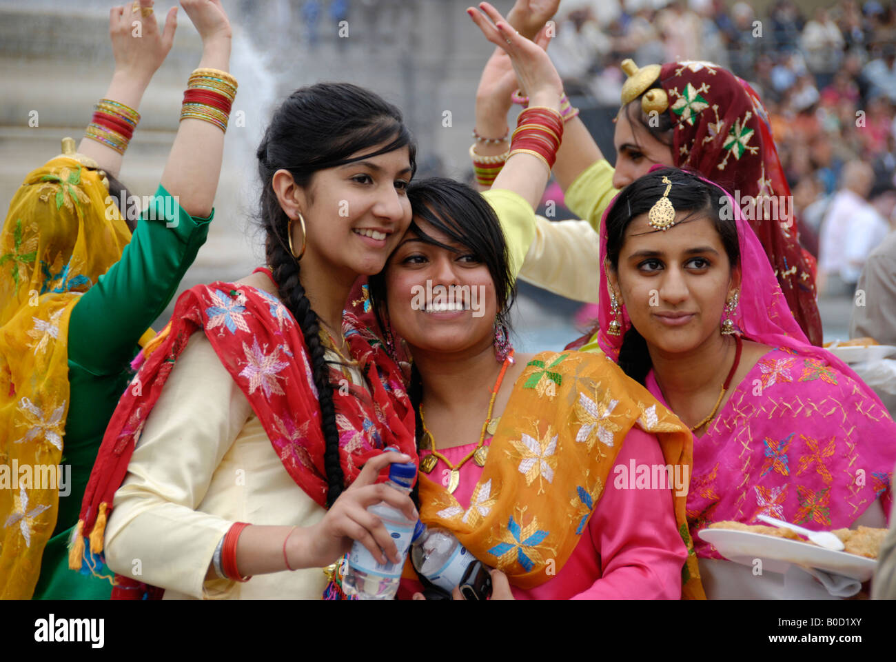 Sikh female dancers in colourful traditional costumes at 2008 Vaisakhi Sikh New Year Festival in Trafalgar Square London Stock Photo