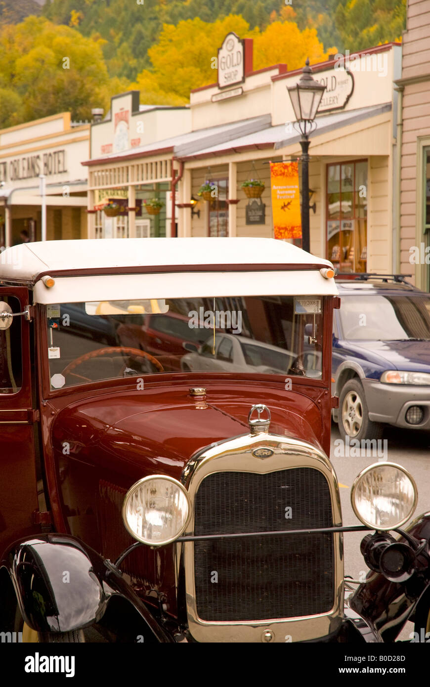 Vintage car parked in Arrow town in autumn, New Zealand Stock Photo