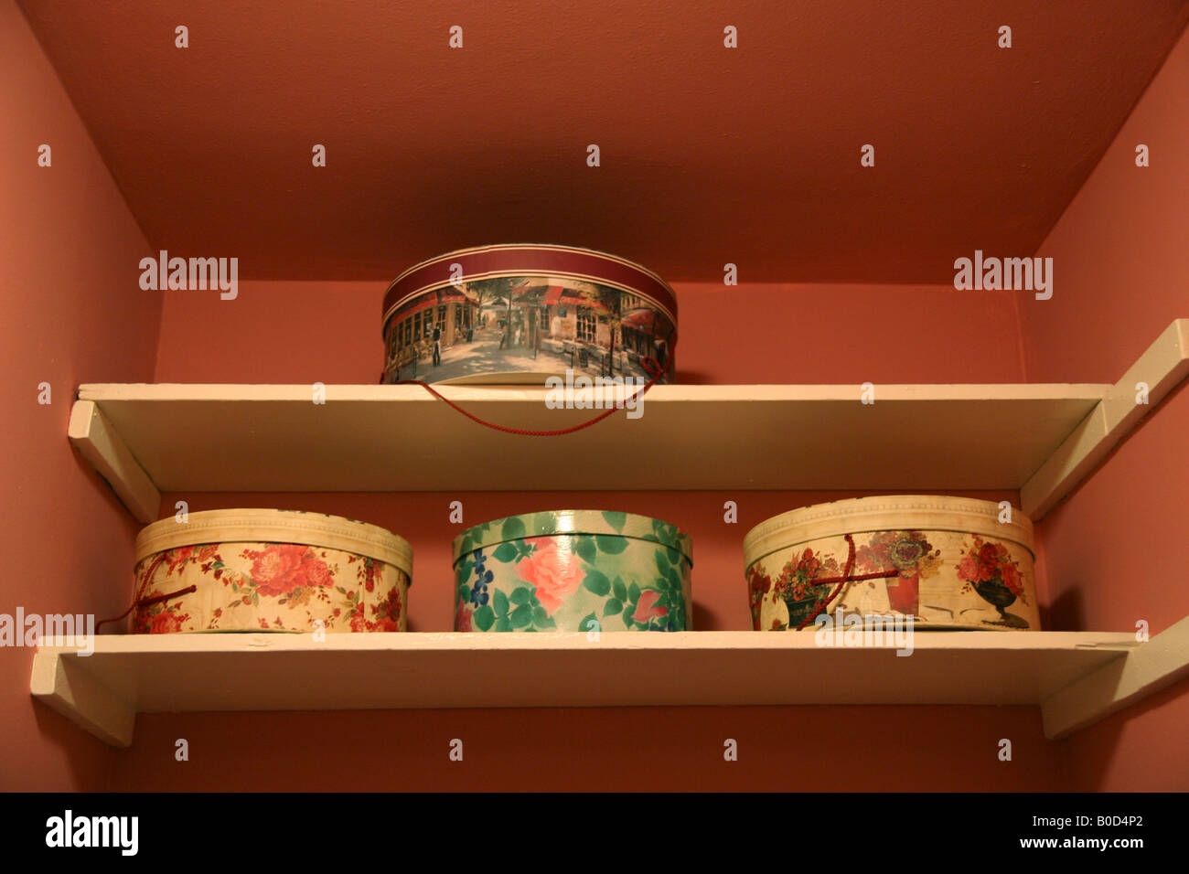 Hat boxes on closet shelves Stock Photo Alamy