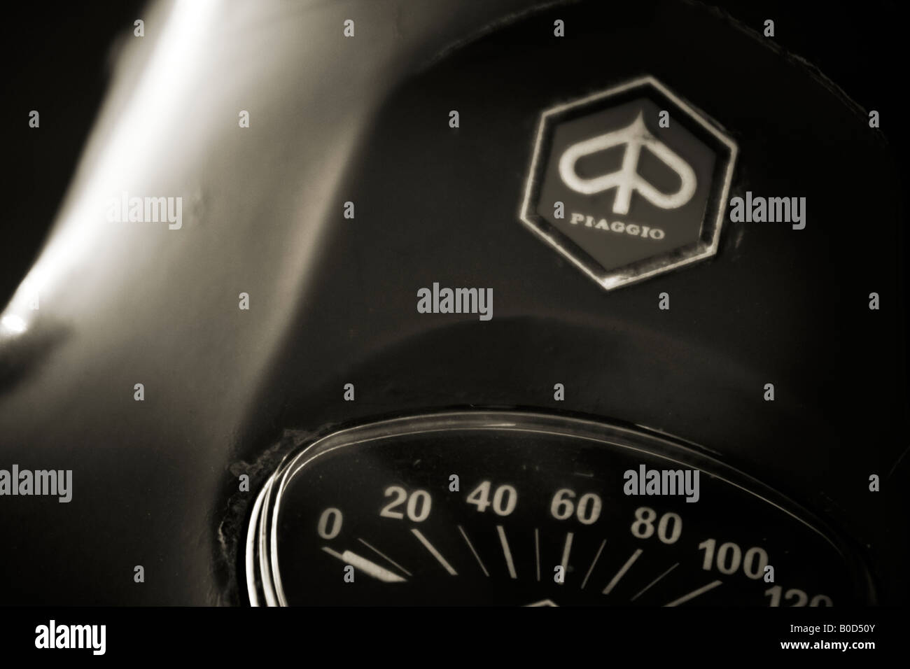Close up of a Piaggio Logo and speedometer on a red Vespa in Coloia del Sacramento Uruguay Stock Photo