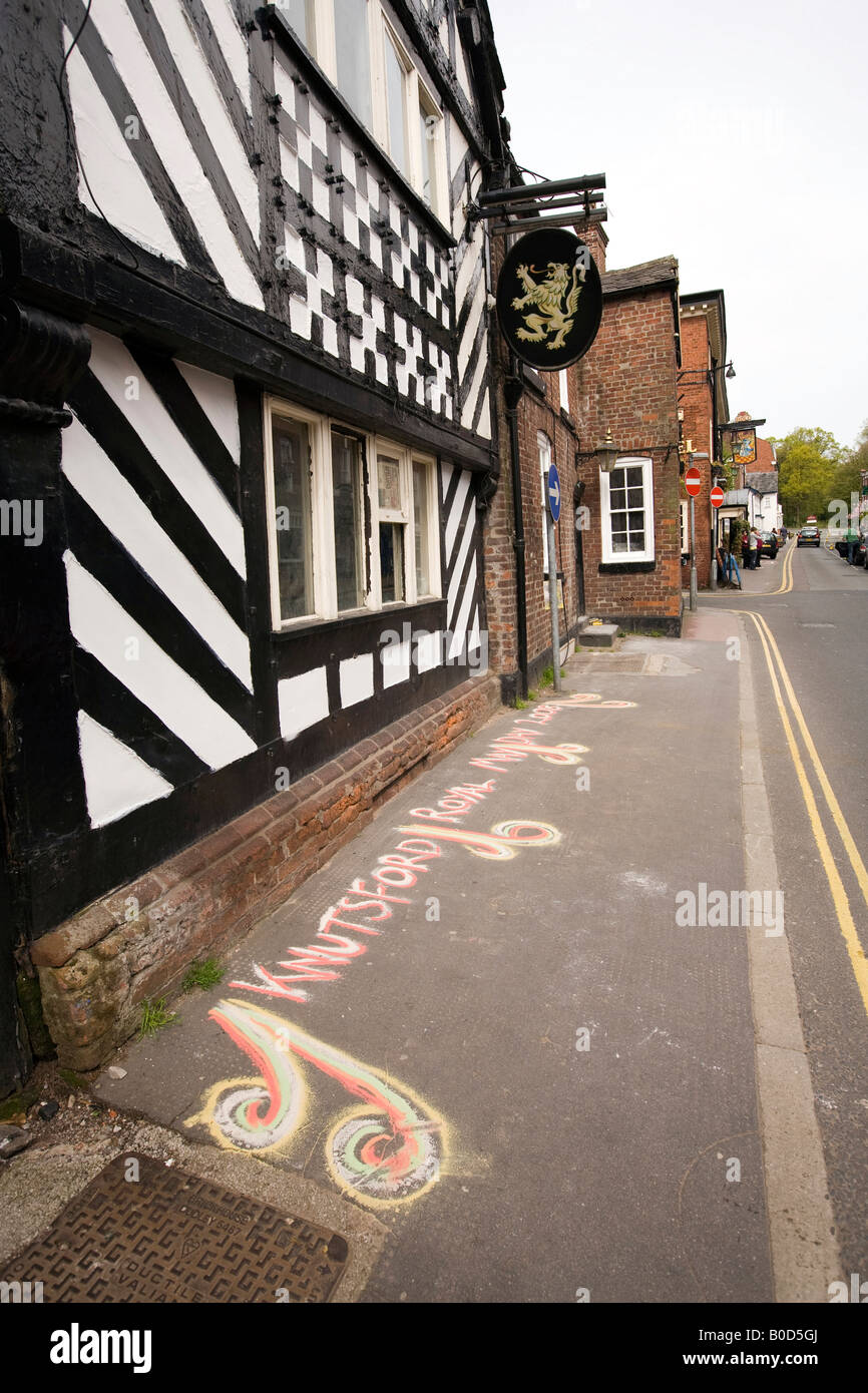 UK Cheshire Knutsford Royal May Day King Street sand message outside old half timbered white bear pub Stock Photo