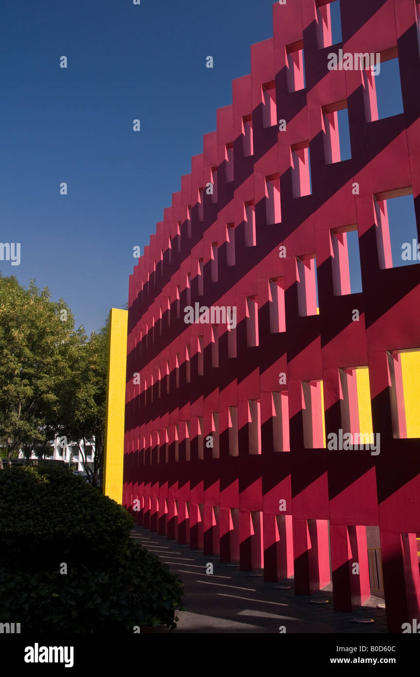 The bright pink and yellow, pierced, front 'wall' of the Camino Real hotel  in the Polanco district of Mexico City Stock Photo - Alamy