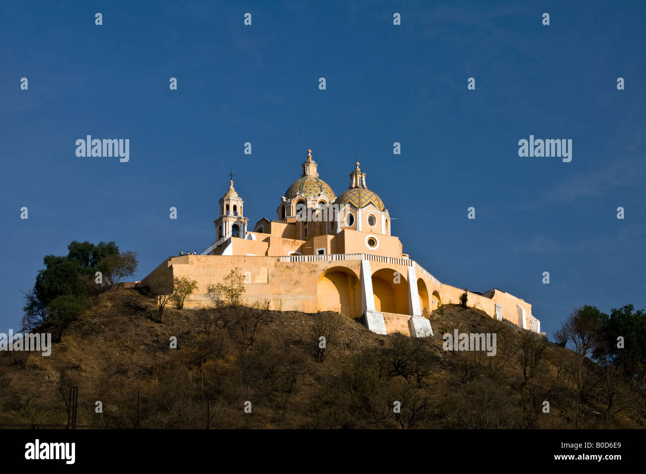 The church of Nuestra Señora de los Remedios, sitting on top of the Tlachihualtepetl pyramid in Cholula, Mexico. Stock Photo