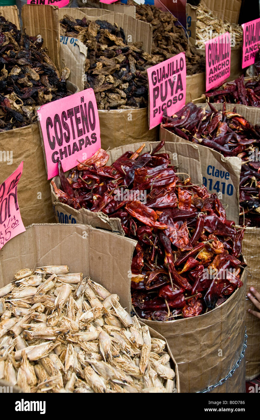 Barrels of dried chillies for sale at store in Puebla, Mexico Stock Photo