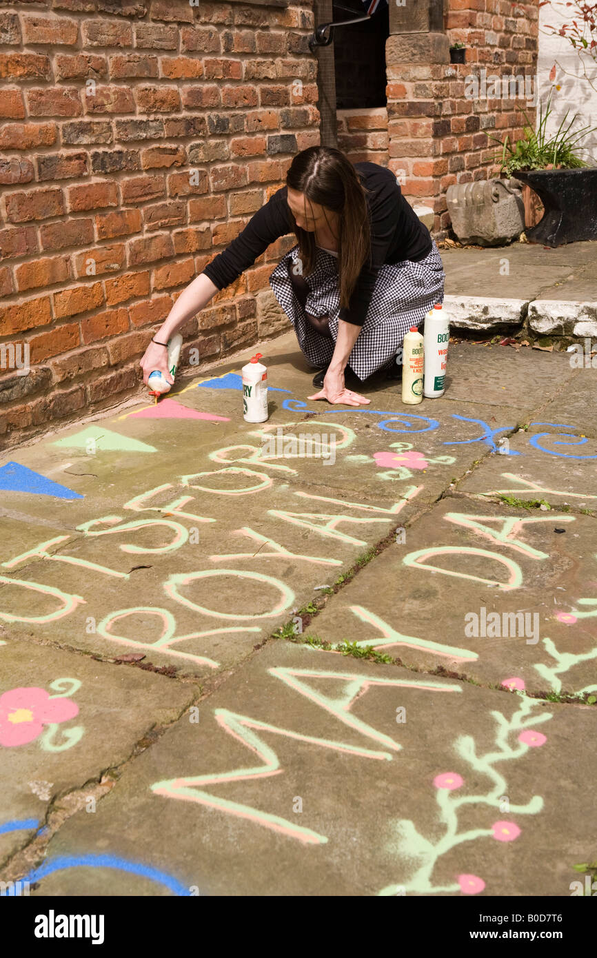UK Cheshire Knutsford Royal May Day Amy Bishop sanding message outside heritage centre Stock Photo