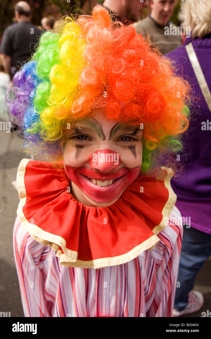UK Cheshire Knutsford Royal May Day child dressed as clown Stock Photo