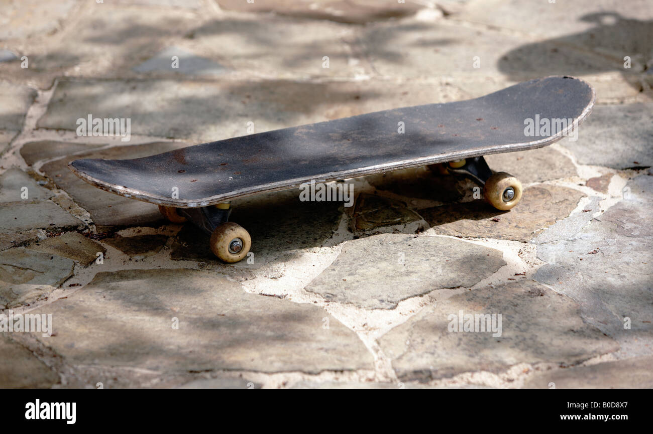A standard sized skateboard with small wheels and grip taped board Stock  Photo - Alamy