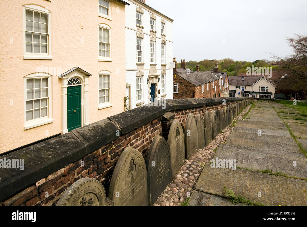 UK Cheshire Knutsford Houses in Church Walk alongside St Johns Parish churchyard Stock