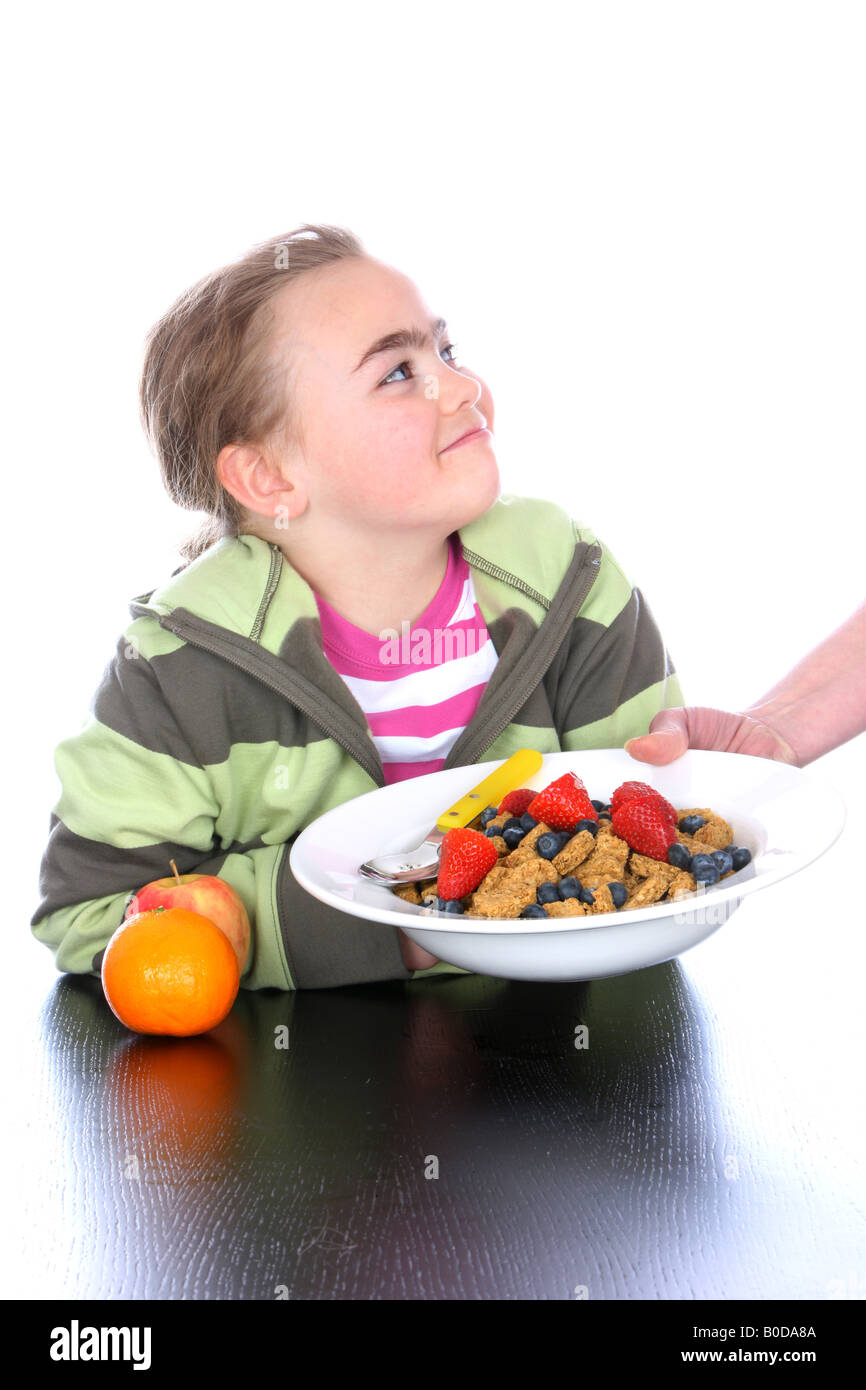 Young Girl with Cereal and Fruit Models Released Stock Photo