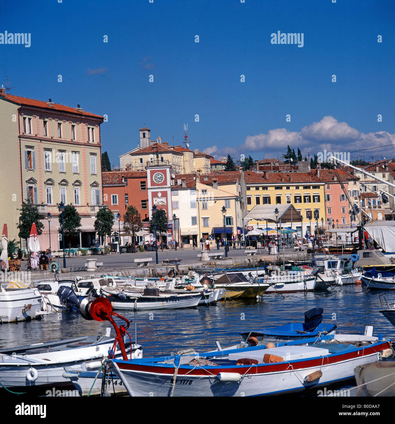 Harbour scene with colourful boats Stock Photo - Alamy