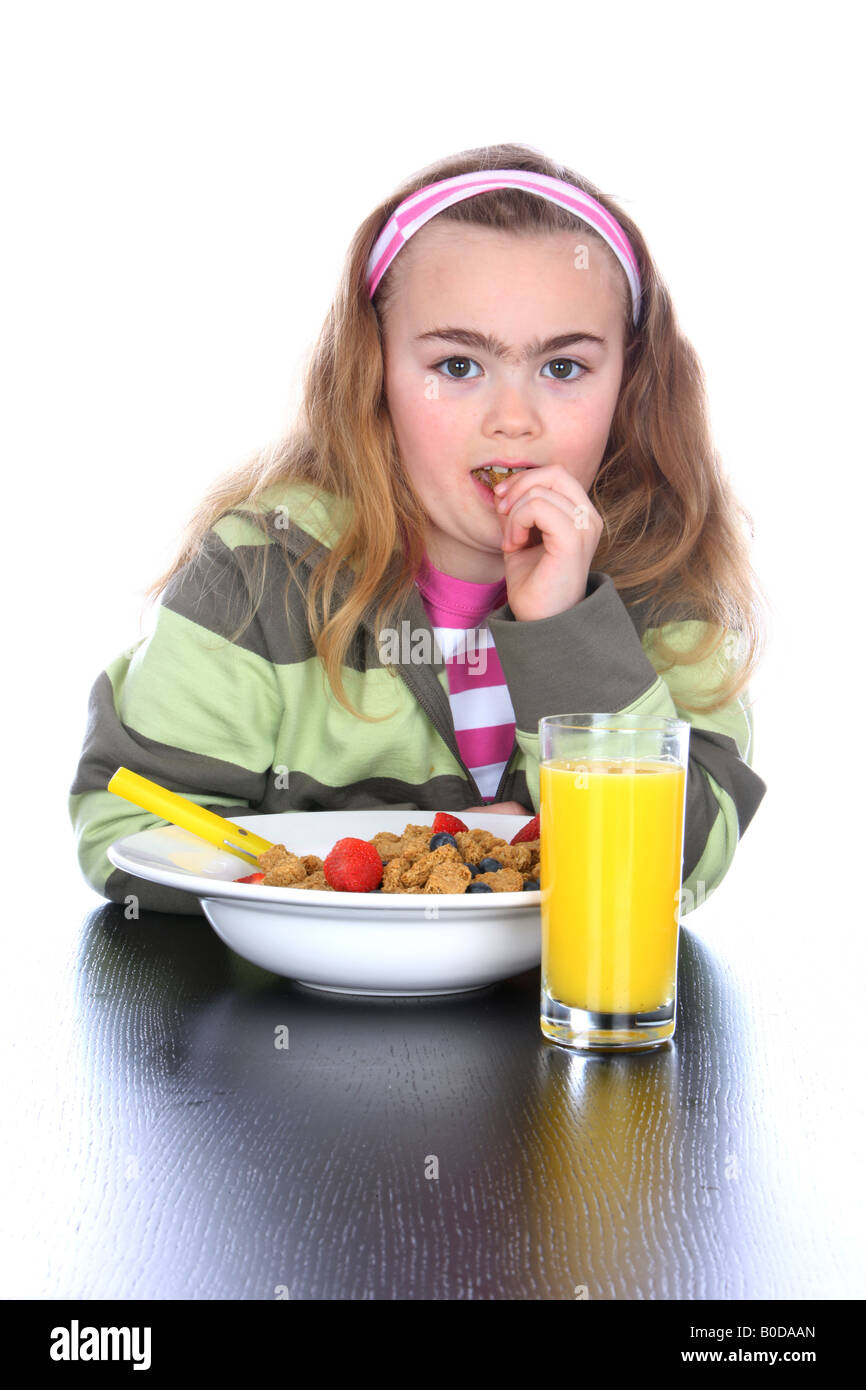 Young Girl Eating Breakfast Models Released Stock Photo