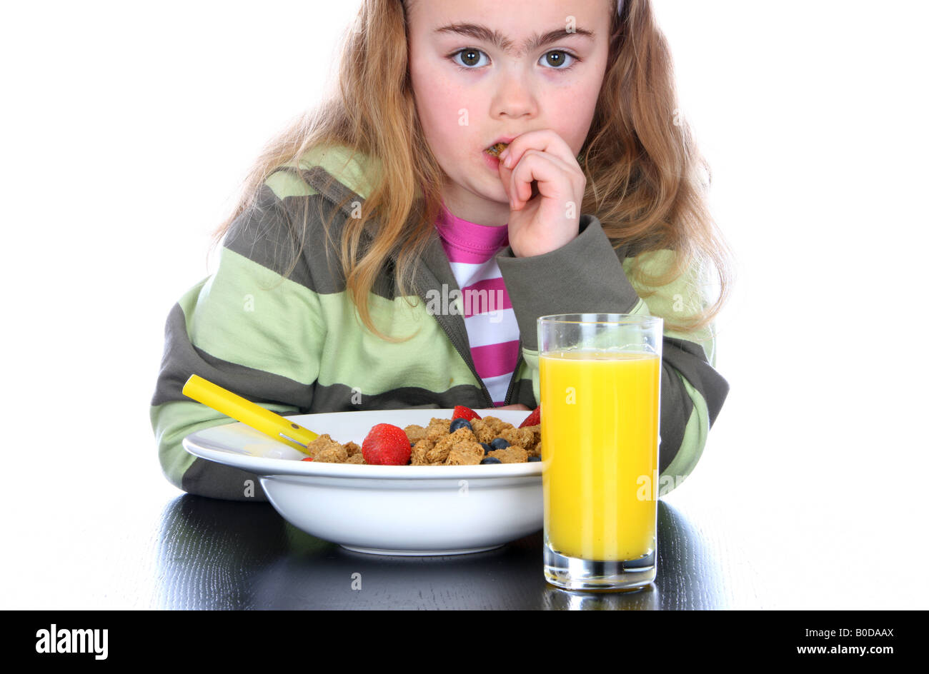 Young Girl Eating Breakfast Models Released Stock Photo