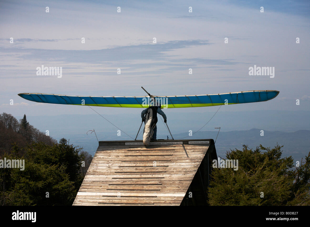 Hang glider preparing to jump from Kandel Mountain Black Forest Germany Stock Photo