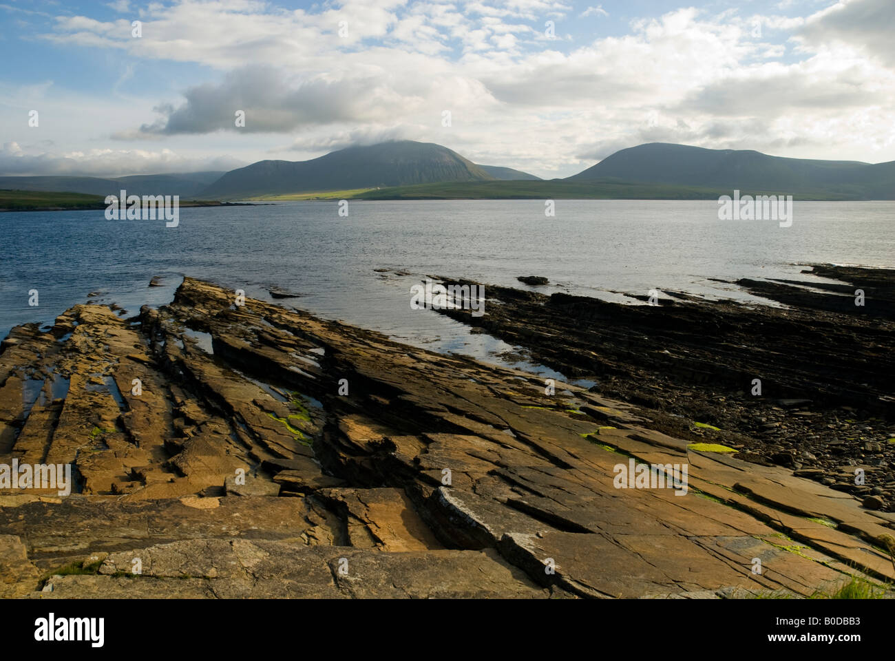 The hills of Hoy over Hoy Sound, from the Ness, near Stromness, Orkney Islands, Scotland, UK Stock Photo