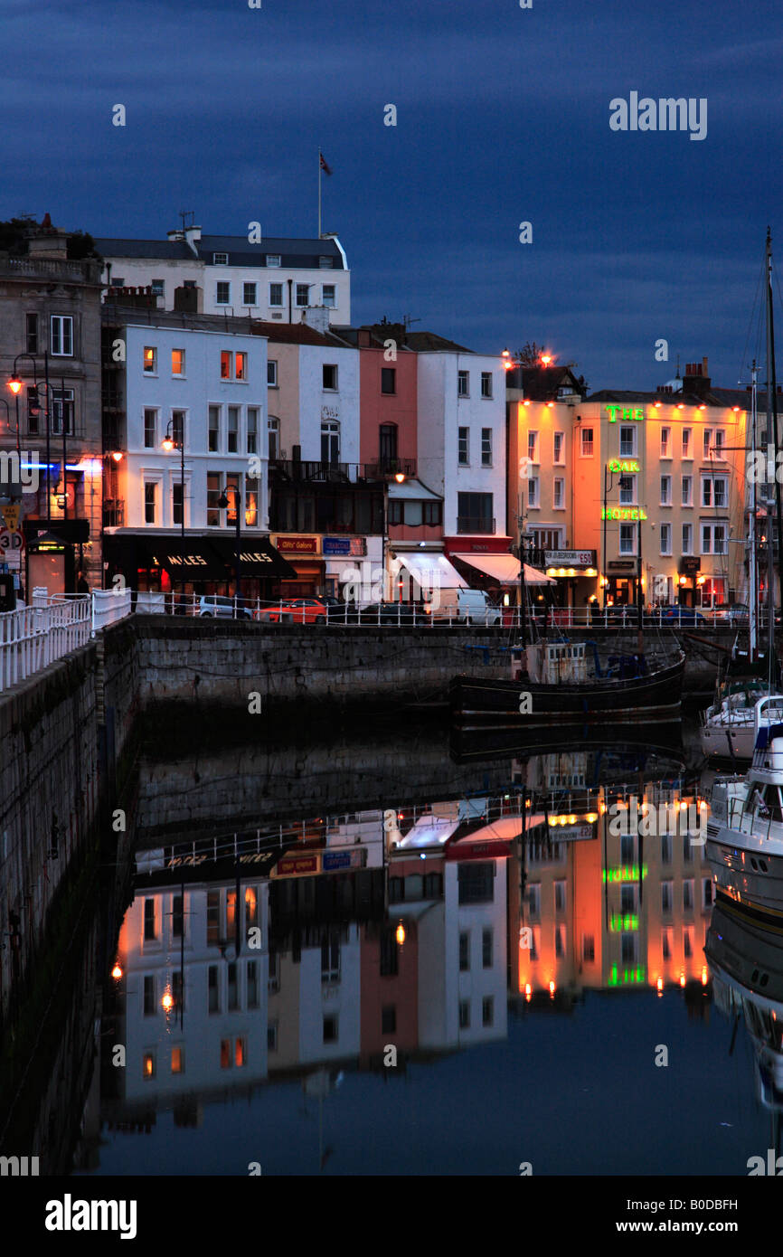Ramsgate, Harbour Parade and town quay at night. Stock Photo