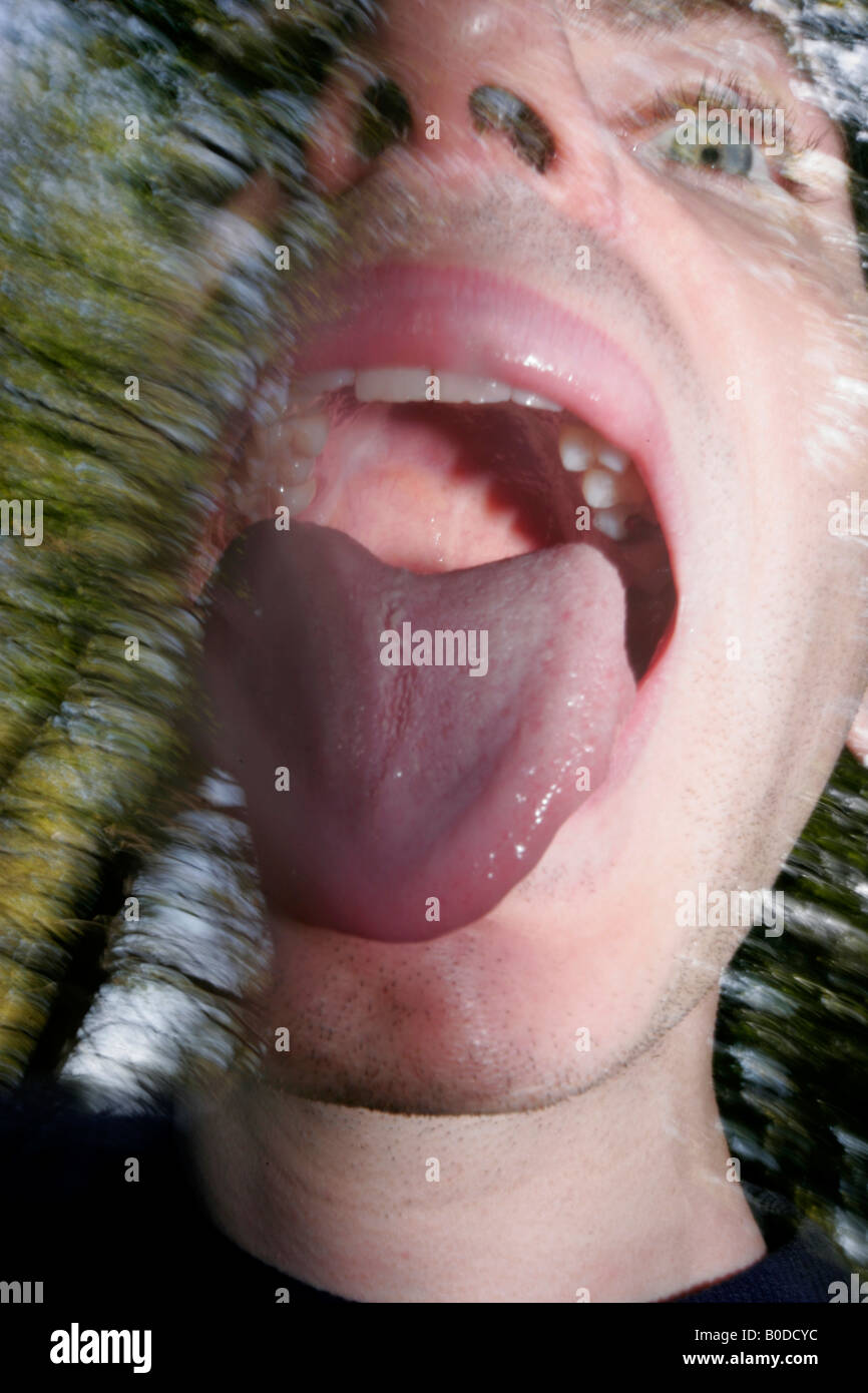 Boy screaming in a forest Stock Photo