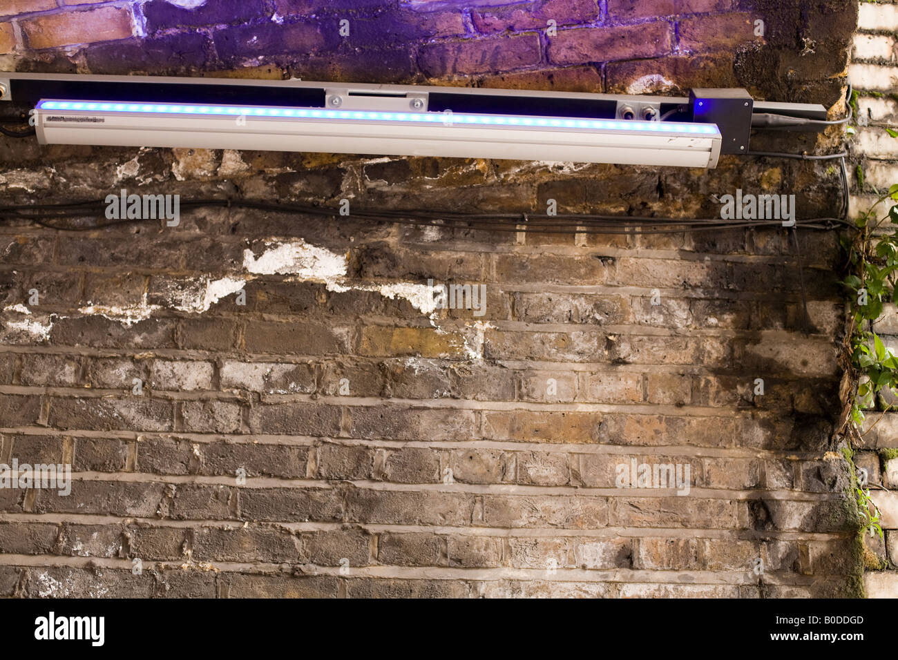 fluorescent tube light in a tunnel in Southwark Stock Photo